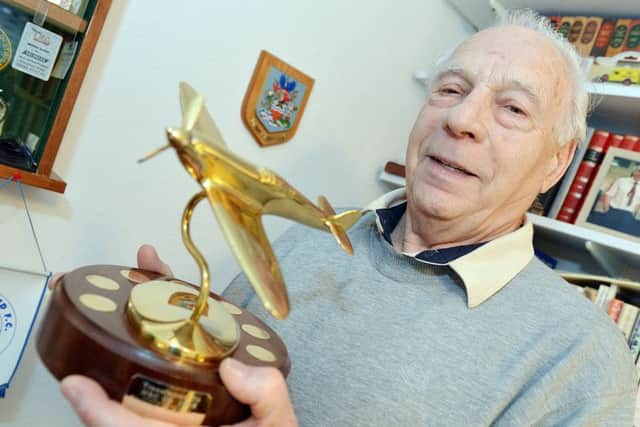 Proud Bill Warwick with the Spitfire Trophy that honoured his research for the Royal Observer Corps Association.