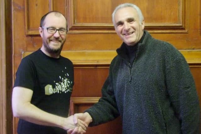 Glenn Tinsley (right) is the new chairman of the board at soundLINCS, taking over from Rob Williams (left)