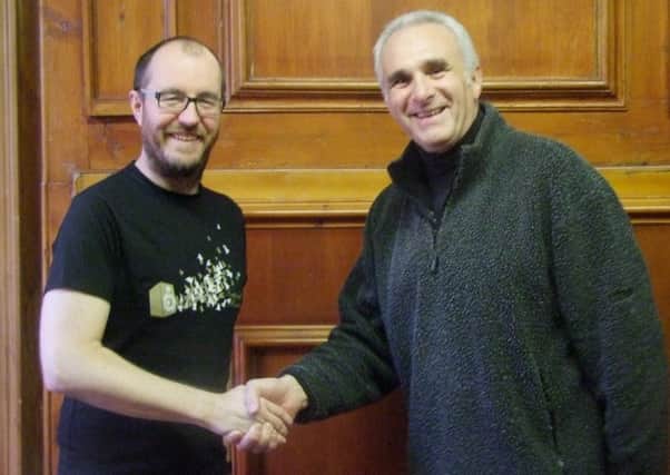 Glenn Tinsley (right) is the new chairman of the board at soundLINCS, taking over from Rob Williams (left)