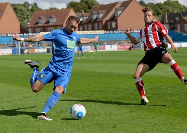 Striker Ashley Worsfold, who scored two of the goals in Gainsborough Trinitys crucial 3-2 victory at bottom-of-the-table Altrincham in the National League North on Saturday.