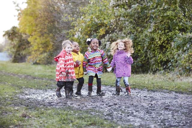 Muddy Puddle Walk. Photo by Jamie Baker/Save The Children.