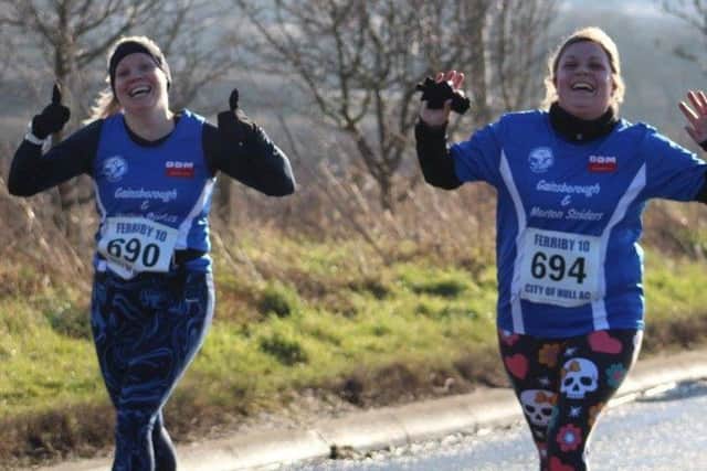 Striders Sam Garrison and Sian Turner on the final climb in the Ferriby 10-Mile race. (PHOTO BY: Lottie Lindley).