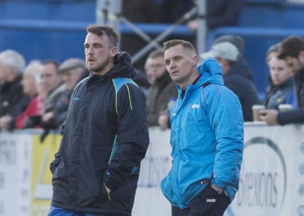 Gainsborough Trinity player-manager Dom Roma (left) pictured on Saturday against Alfreton Town. Picture: Sarah Washbourn / www.yellowbellyphotos.com