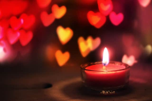 St Valentine's day greeting card with candle and hearts
