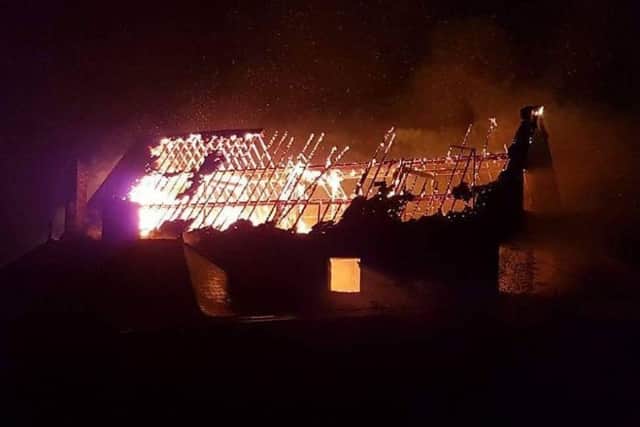 A Guardian reader sent in this dramatic photo of the fire at its peak.
