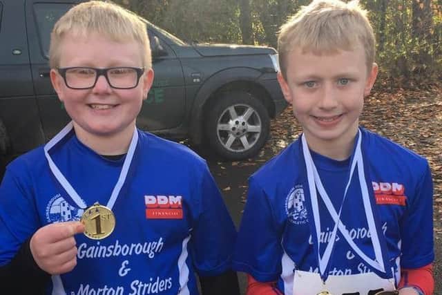 Thomas Sweeting. who is pictured here with his brother Rhys, covered himself in glory at the Belvoir Challenge, even though he is only nine years old.