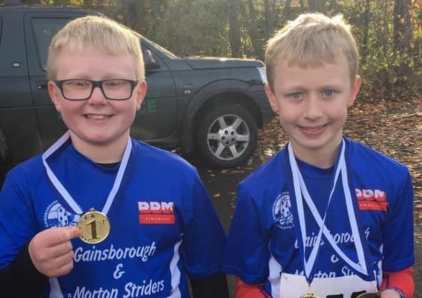 Thomas Sweeting. who is pictured here with his brother Rhys, covered himself in glory at the Belvoir Challenge, even though he is only nine years old.
