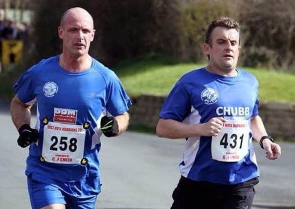 Race organiser Kevin Housham (left), pictured here with fellow Strider Mark Rodgers.