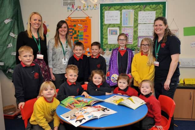 Staff and children at St George Primary School Gainsborough celebrate their Good Ofsted report, pictured are deputy head Holly Ruddlesdin, Keystage 2 leader Katy Vaux and Inclusion manager Kate Collins with children