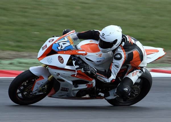 Dean Hipwell in action at Brands Hatch, where he was hampered by problems with his right arm.
