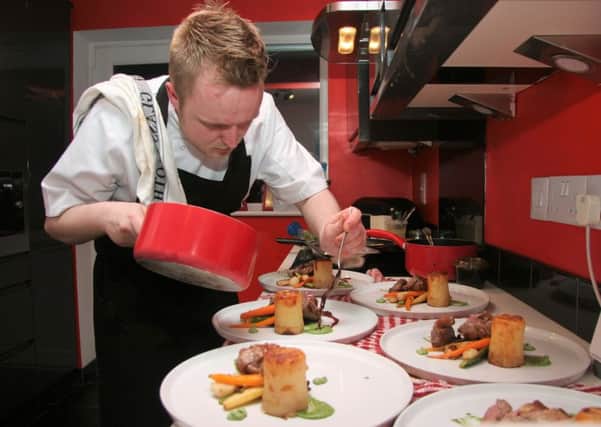 Chef Karl Tyler plates up