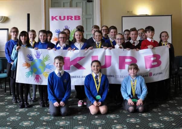 Members of the Worksop Junior Council proudly display their KURB banner.