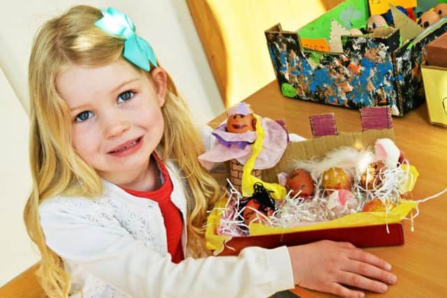 Ella Tune, four, pictured with her Rapunzel themed decorated egg. Picture: Marie Caley NEPB Easter MC 3