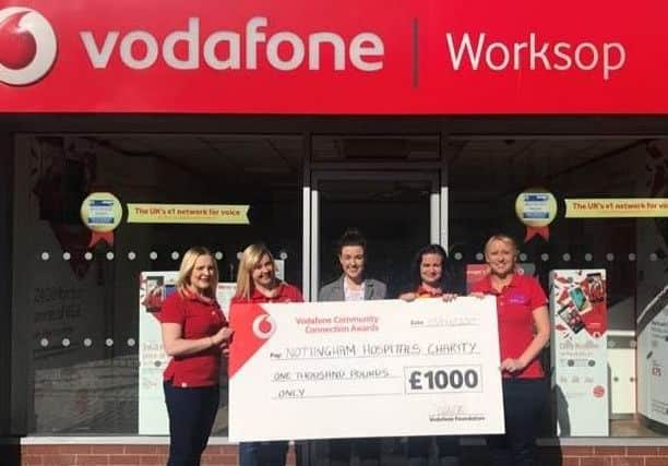 Vodafone present a £1,000 award to Nottingham Hospitals Charity.