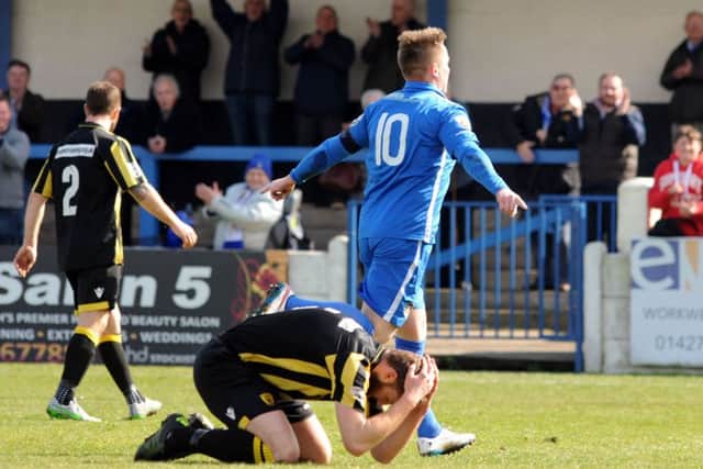 Nathan Jarman celebrates a goal for Gainsborough Trinity.