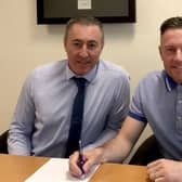 Gainsborough Trinity chairman Richard Kane and manager Dave Frecklington as he signs a new two-year deal. PHOTO: Gainsborough Trinity