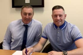 Gainsborough Trinity chairman Richard Kane and manager Dave Frecklington as he signs a new two-year deal. PHOTO: Gainsborough Trinity