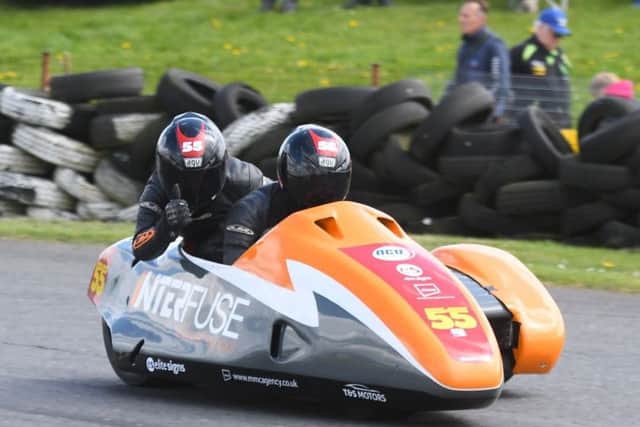 Team SAS, alias Jen and Giles Stainton, in sidecar-racing action at Darley Moor in Derbyshire (PHOTO BY: Sid Diggins).