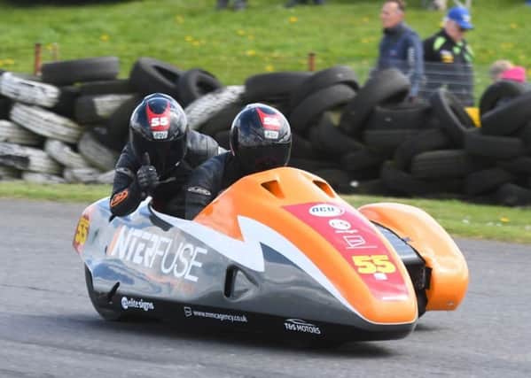 Team SAS, alias Jen and Giles Stainton, in sidecar-racing action at Darley Moor in Derbyshire (PHOTO BY: Sid Diggins).