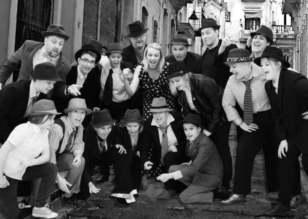 The cast of Guys and Dolls.
