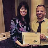 Procurement director Andrea Smith and deputy Richard Somerset receiving the award.