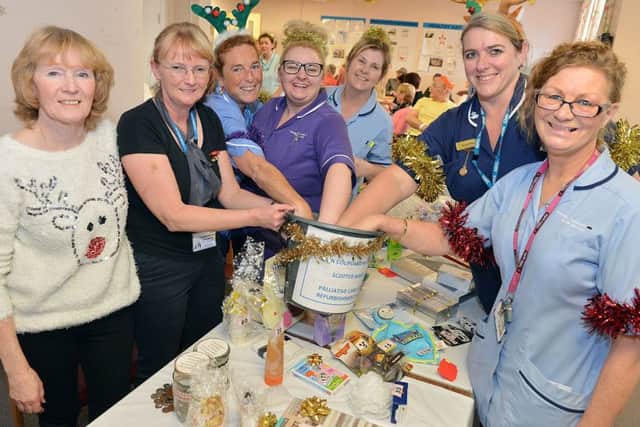 Sister Donna Phillips (second from right) and other Scotter Ward staff, pictured at a Christmas event.