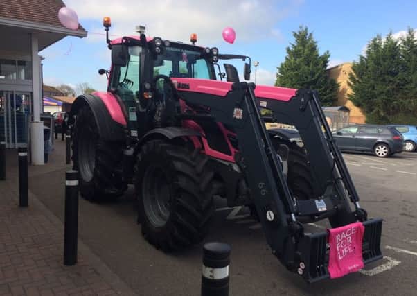 The pink tractor will tour various events this summer