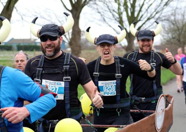 Gainsborough Strider Steve Tait and his Edinburgh Marathon teammates, dressed as a Viking longboat.