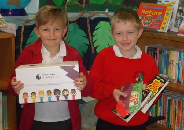 Parish school pupils with their special Premier League prize books