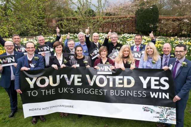 Supporters of the BID celebrating after the "yes" vote.