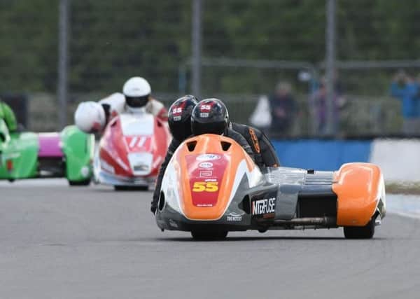 Team SaS, alias Stainton and Stainton, in sidecar-racing action at Donington Park, where they recorded a fine fifth-placed finish in the British Championship. (PHOTO BY: Sid Diggins)