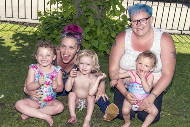 Enjoying the sun at The Canch in Worksop. Katie Morris and Katie Lee with children, from left, Lohla Morris, four, Rosie Lee-Apthorpe, 17months and Jonah Blades, two
Picture: Sarah Washbourn / www.yellowbellyphotos.com