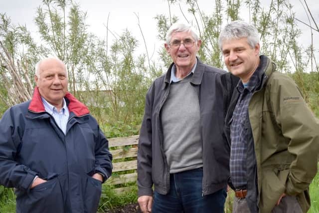 Retford Rotarians Roger Stenson (left) and David Towers with Dom Schad (right) of the Muddy Fork charity. Picture: Di Fisher
