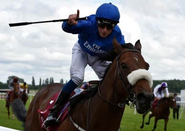 Jockey William Buick salutes the Newbury crowd after winning the Group One Al Shaqab Lockinge Stakes on Ribchester.