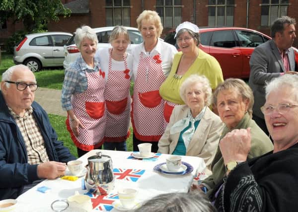 Visitors to All Saints Church enjoy a celebration tea, courtesy of church volunteers, to mark the community garden project completed by staff from the Gainsborough Marks and Spencer store.