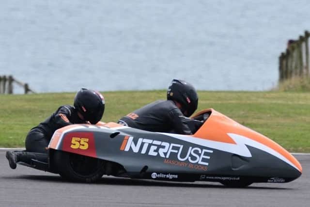 Sidecar-racing husband-and-wife duo Jen and Giles Stainton, alias Team Sas, in action at Anglesey for the Wirral Club Championship.