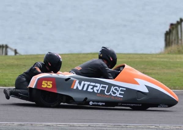 Sidecar-racing husband-and-wife duo Jen and Giles Stainton, alias Team Sas, in action at Anglesey for the Wirral Club Championship.