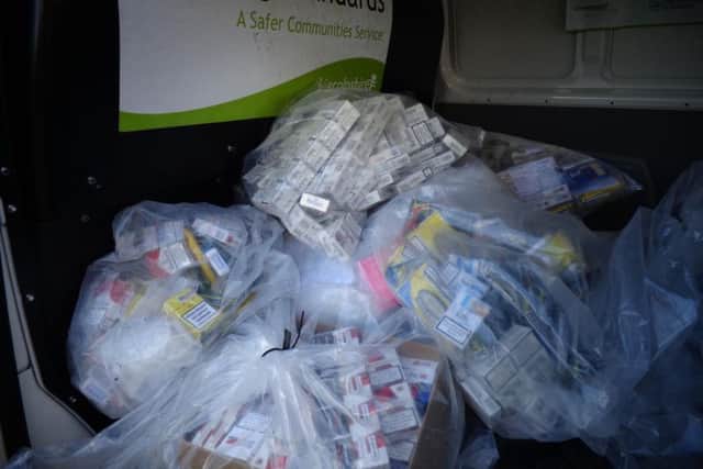 Some of the bags of fake cigarettes which have been seized.