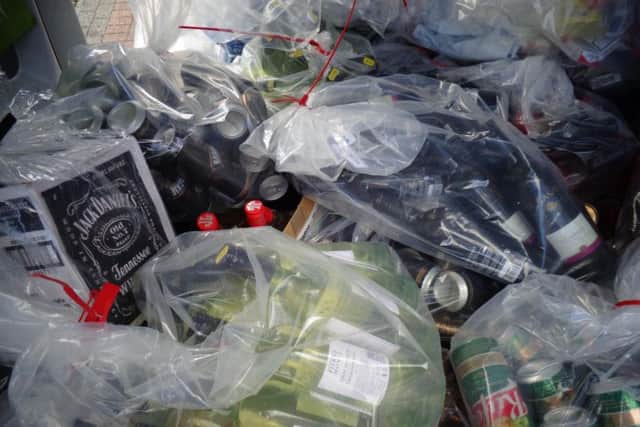 The fake alcohol which will be recycled to make electricity.
