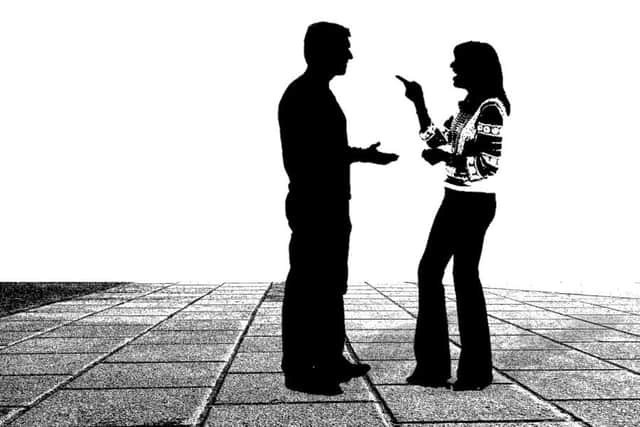 Couple in conversation. Photo by Pixabay.