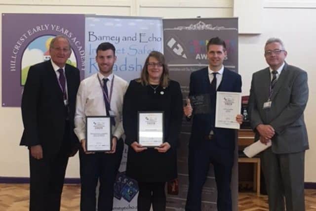 Luke Lovelidge (second right) has won a special national award for his contribution to teaching at Hillcrest Early Years Academy in Gainsborough