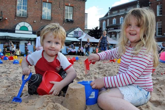 Gainsborough Beach Party.Mia 4 and her 2 year old brother Tyrion Browne-Maclennan get busy with sand castle building.