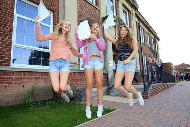 GCSE results day 2017 at Queen Elizabeth's High School in Gainsborough. Pictured are Eleanor Havershon, Lucy Ramsay, and Emma Arguile.