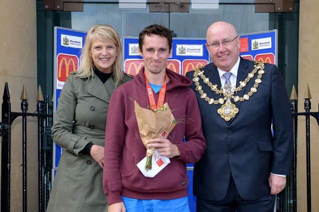 Mansfield 5 and 10k, Mens 10k, 1st placed Stuart King pictured with Jackie Moore of sponsors Mcdonalds and Mansfield Deputy Mayor Coun Mick Barton
