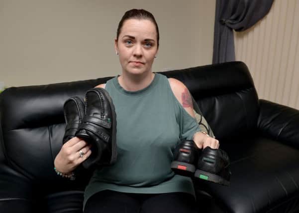 Emma Kirk's children were put in detention at Outwood Academy Valley for wearing shoes the school say are not suitable
