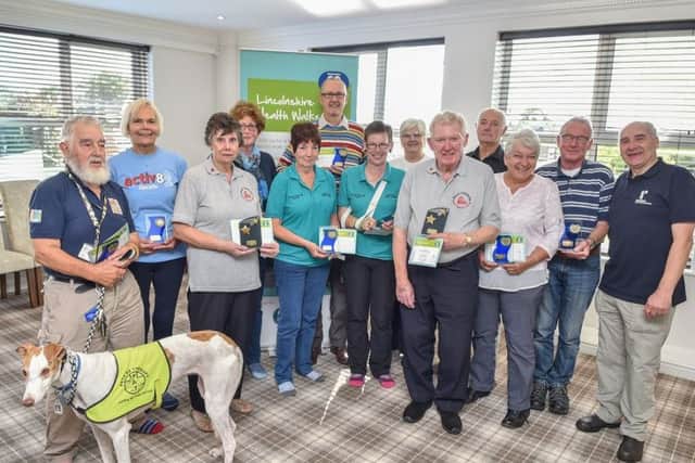 The award presentation group, from left: Ian Kendrick, Ann Ransome, Carol Wilkinson, Sue Ellison, Rosemary Saunders, Andrew Kiddle, Karen Bridges, Ann Bradshaw, Ernie Wilkinson, Brian Holman, Sue Crew, Paul Frodsham, Stuart Parker (Lincolnshire Co-op). Picture: Steve Smailes