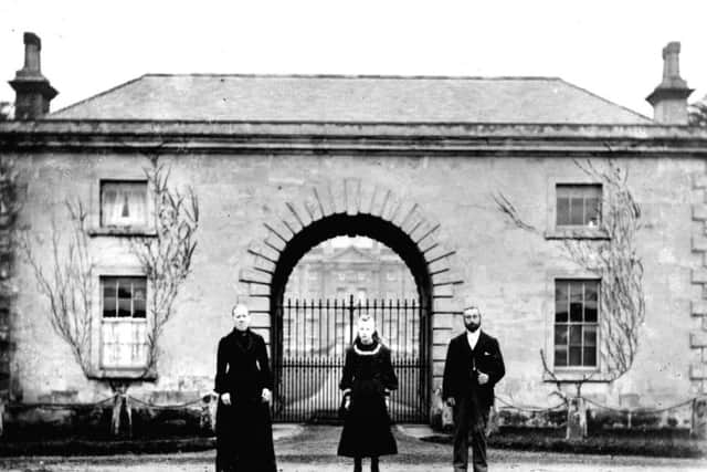 Staff outside the gatehouse of Cusworth Hall at the time of Lady Isabella