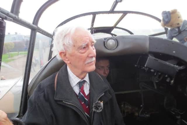 RAF veteran Eddie Humes tours a restored Lancaster Bomber.