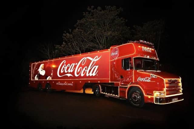 The eye-catching Coca-Cola Christmas truck.