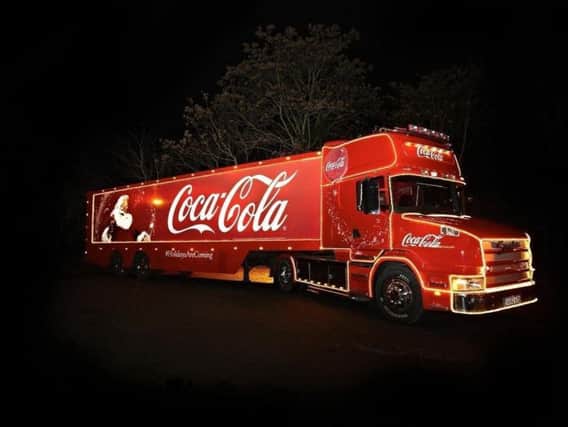 The eye-catching Coca-Cola Christmas truck.